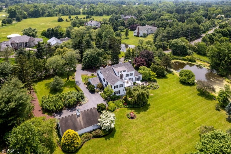 122 Bedens Brook Road Skillman, NJ 08558 - Photo 43 of 47 an aerial view of residential house with swimming pool and outdoor space