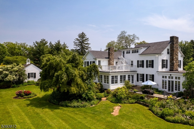 122 Bedens Brook Road Skillman, NJ 08558 - Photo 45 of 47 a front view of a house with a yard