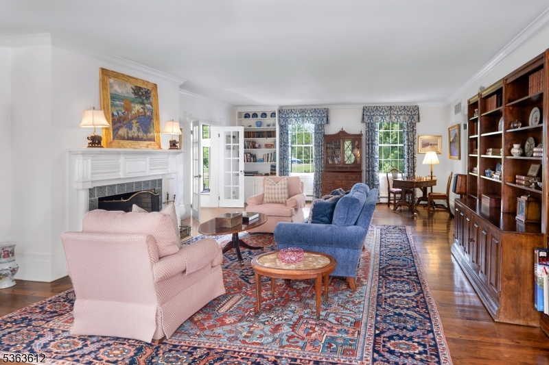 122 Bedens Brook Road Skillman, NJ 08558 - Photo 7 of 47 a living room with furniture and a fireplace