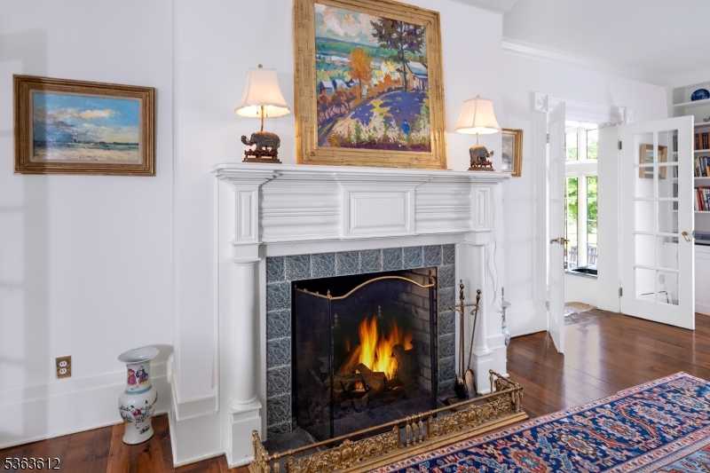 122 Bedens Brook Road Skillman, NJ 08558 - Photo 9 of 47 a living room with furniture and a fireplace