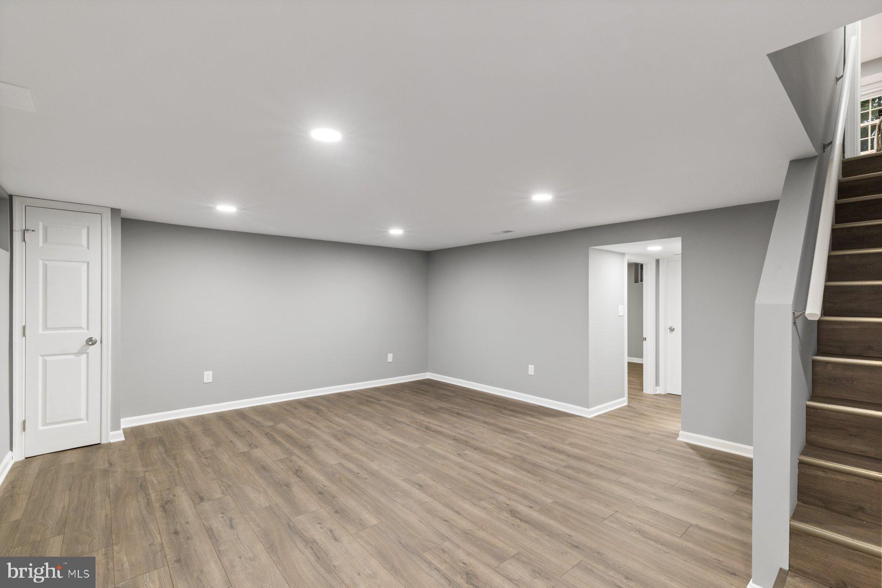 1579 Dellsway Road Towson, MD 21286 - Photo 19 of 33 wooden floor in an empty room with a window