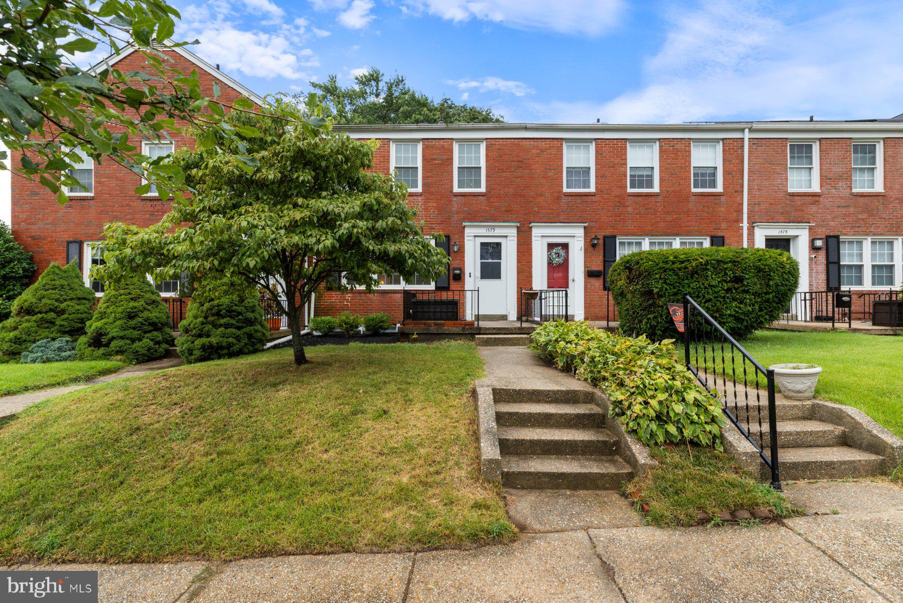 1579 Dellsway Road Towson, MD 21286 - Photo 29 of 33 a front view of a house with a yard