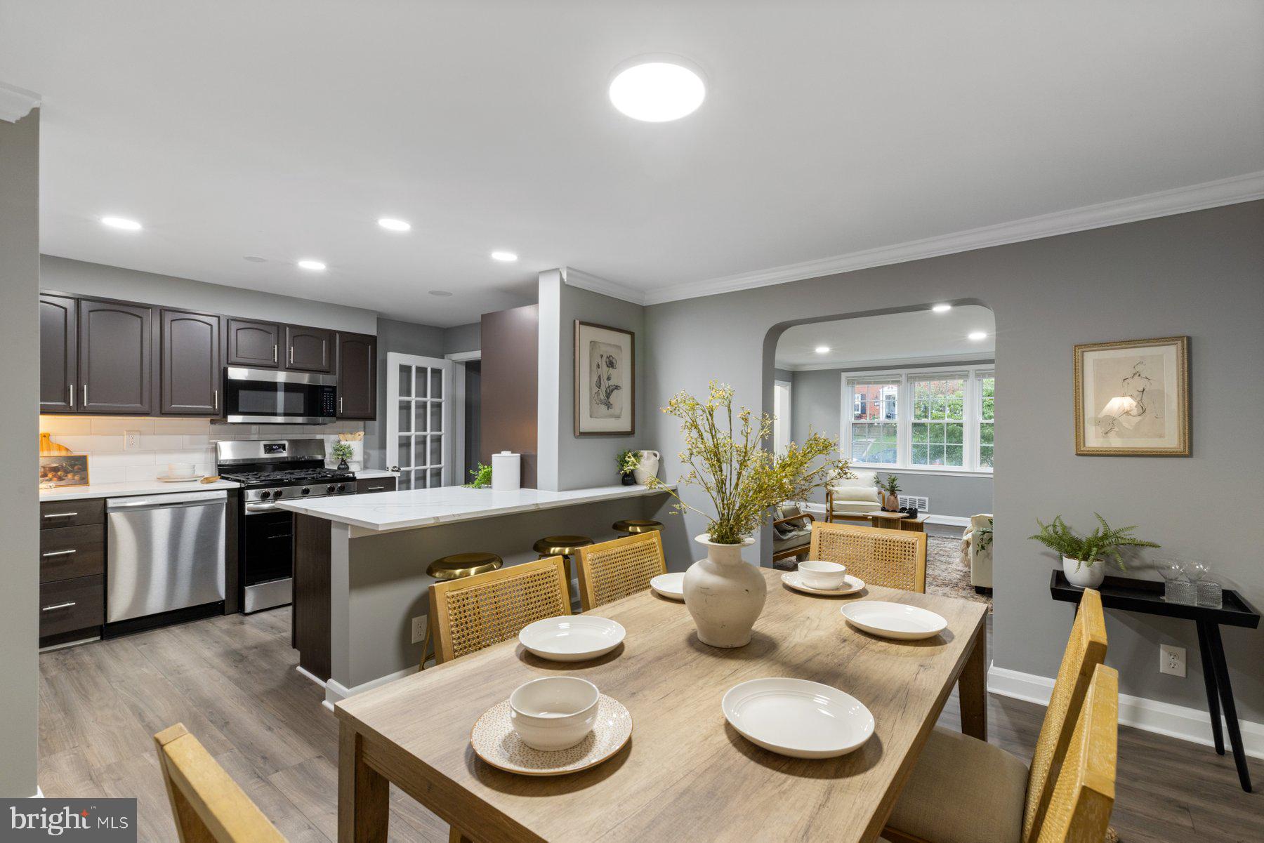 1579 Dellsway Road Towson, MD 21286 - Photo 3 of 33 a large kitchen with furniture and a kitchen island