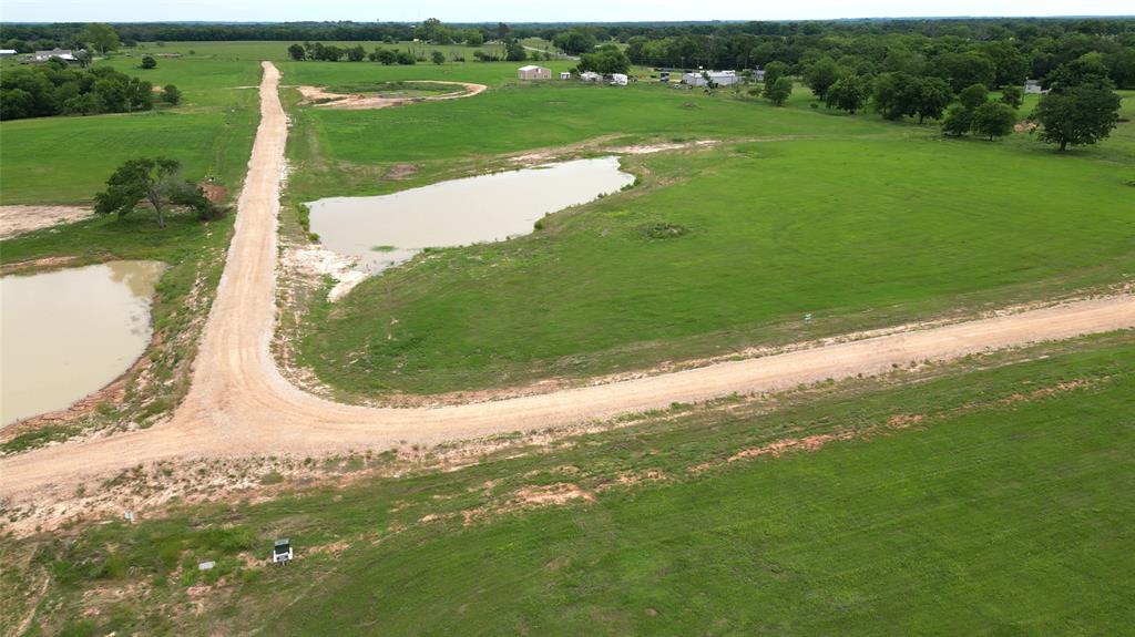 Lot 11 Fm514 Road Yantis, TX 75497 - Photo 6 of 6 a view of a golf course with a lake