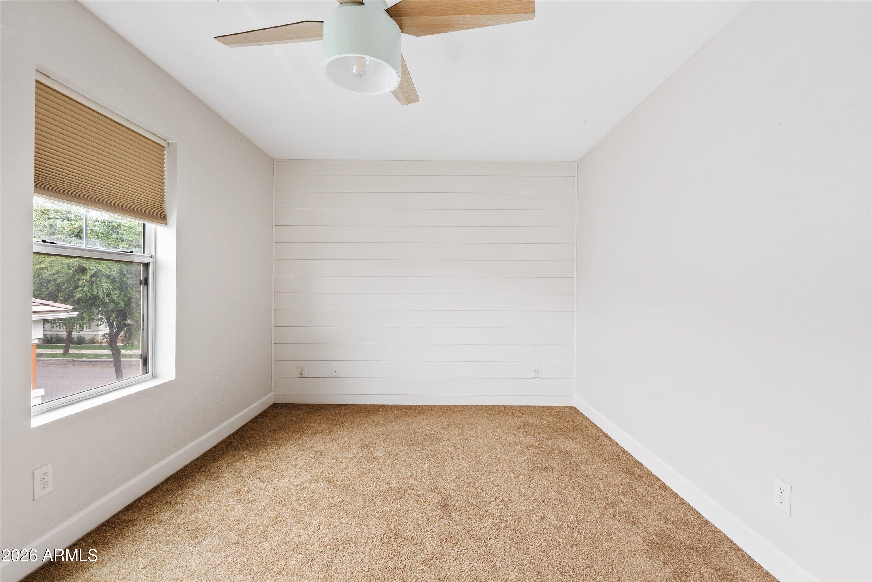 3112 East Agritopia Loop North Gilbert, AZ 85296 - Photo 31 of 40 a view of a room that has a window in it