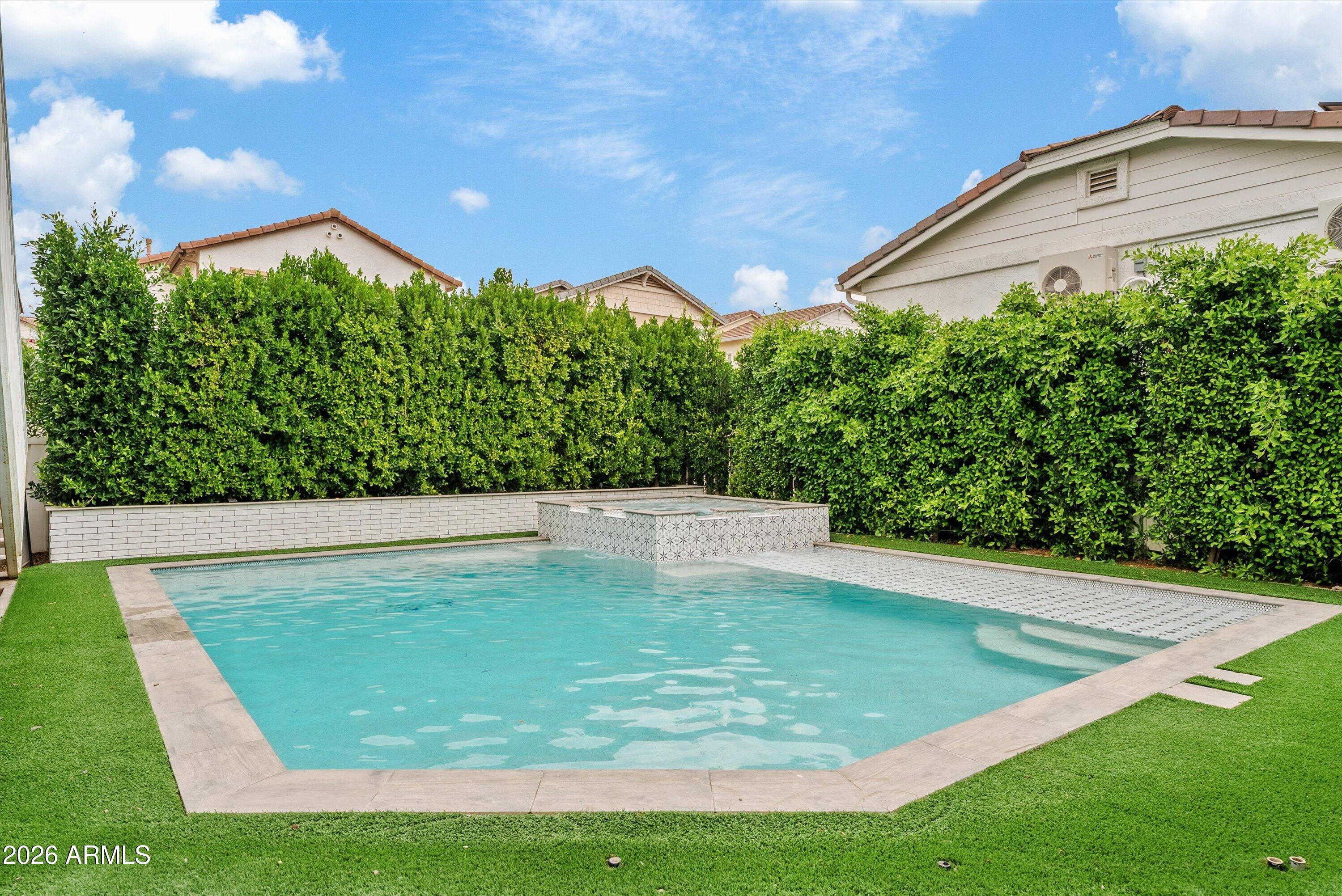 3112 East Agritopia Loop North Gilbert, AZ 85296 - Photo 4 of 40 a view of a big yard with potted plants