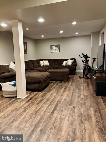 a living room with furniture and a couch