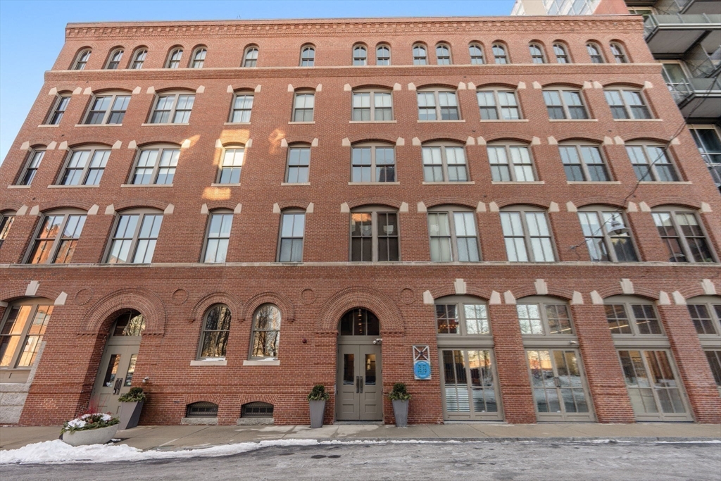35 Channel Center Street, Unit 303 Boston, MA 02210 - Photo 27 of 28 a front view of a building