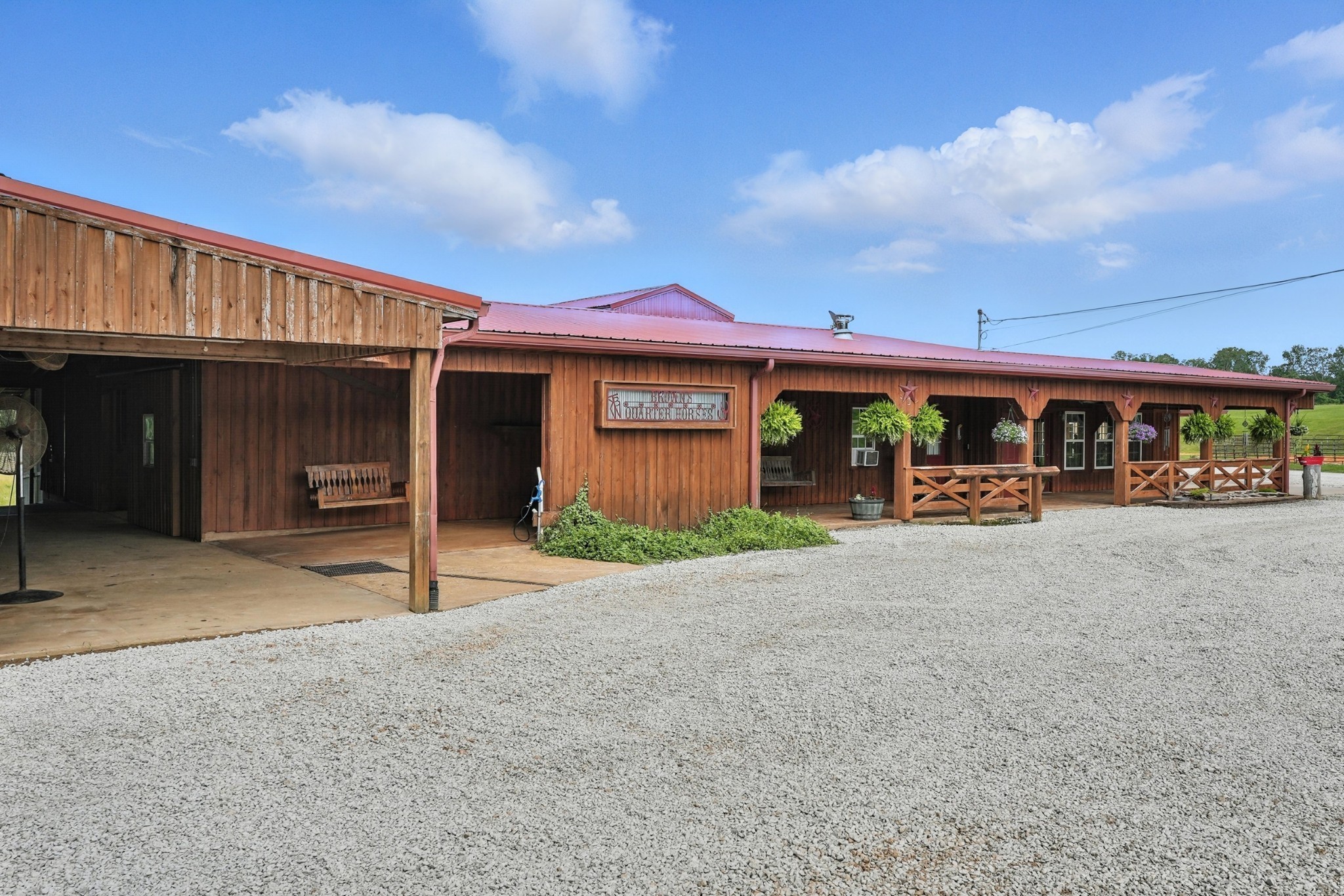 a view of a car park in front of house