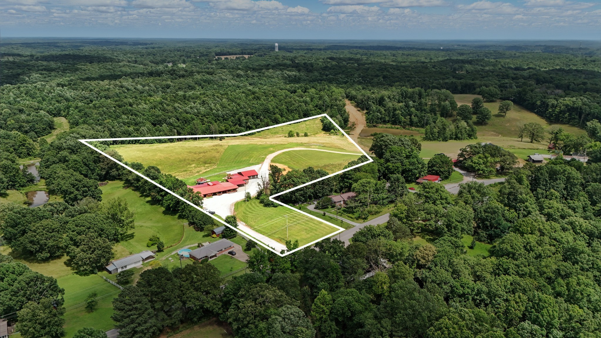 1880 Clydeton Road Waverly, TN 37185 - Photo 4 of 85 an aerial view of a tennis court