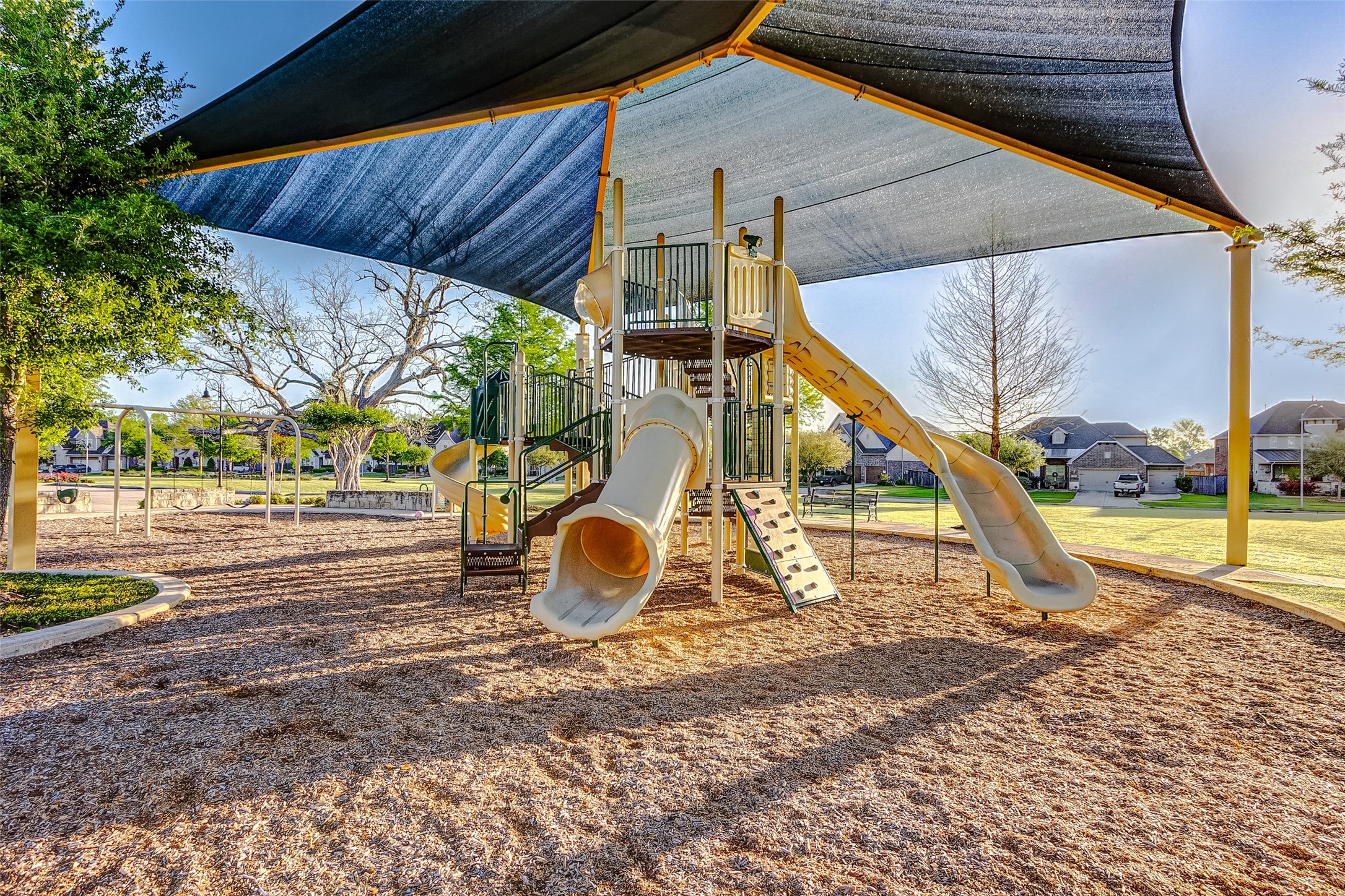 5318 Streamside Trail Fulshear, TX 77441 - Photo 38 of 43 At Fulbrook on Fulshear Creek, children have their own dedicated playground area where they can safely enjoy outdoor play while you relax amidst the soothing sounds of nature.