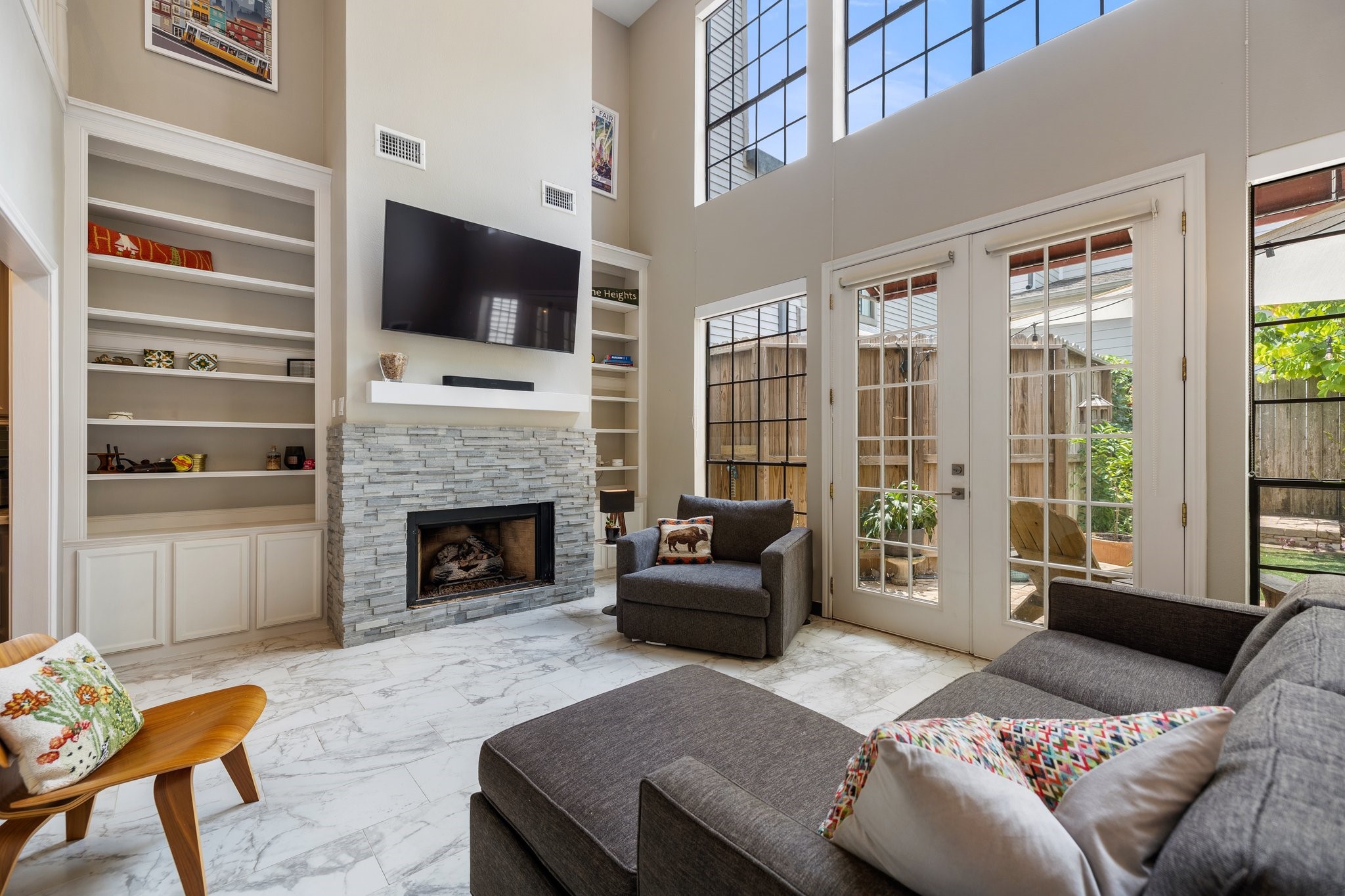 a bedroom with a bed and a fireplace