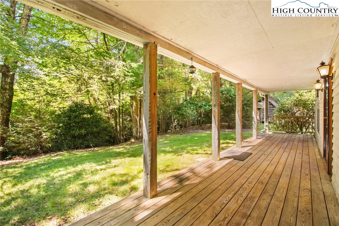 2166 George Hayes Road Boone, NC 28607 - Photo 12 of 50 a view of a room with wooden floor and deck