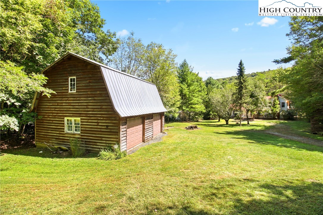 2166 George Hayes Road Boone, NC 28607 - Photo 17 of 50 a view of a house with a backyard
