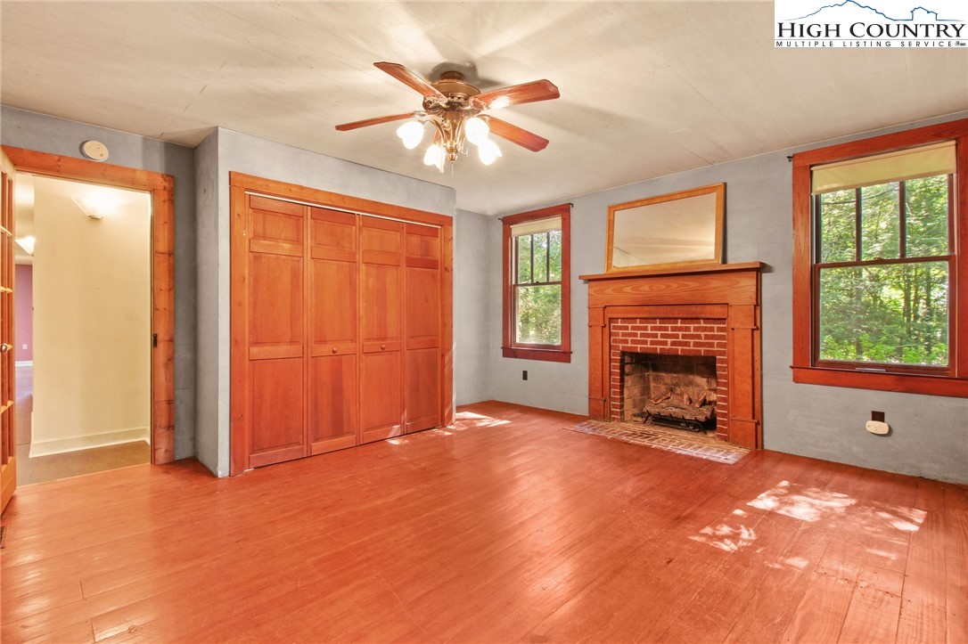 2166 George Hayes Road Boone, NC 28607 - Photo 26 of 50 a view of an empty room with window and fire place