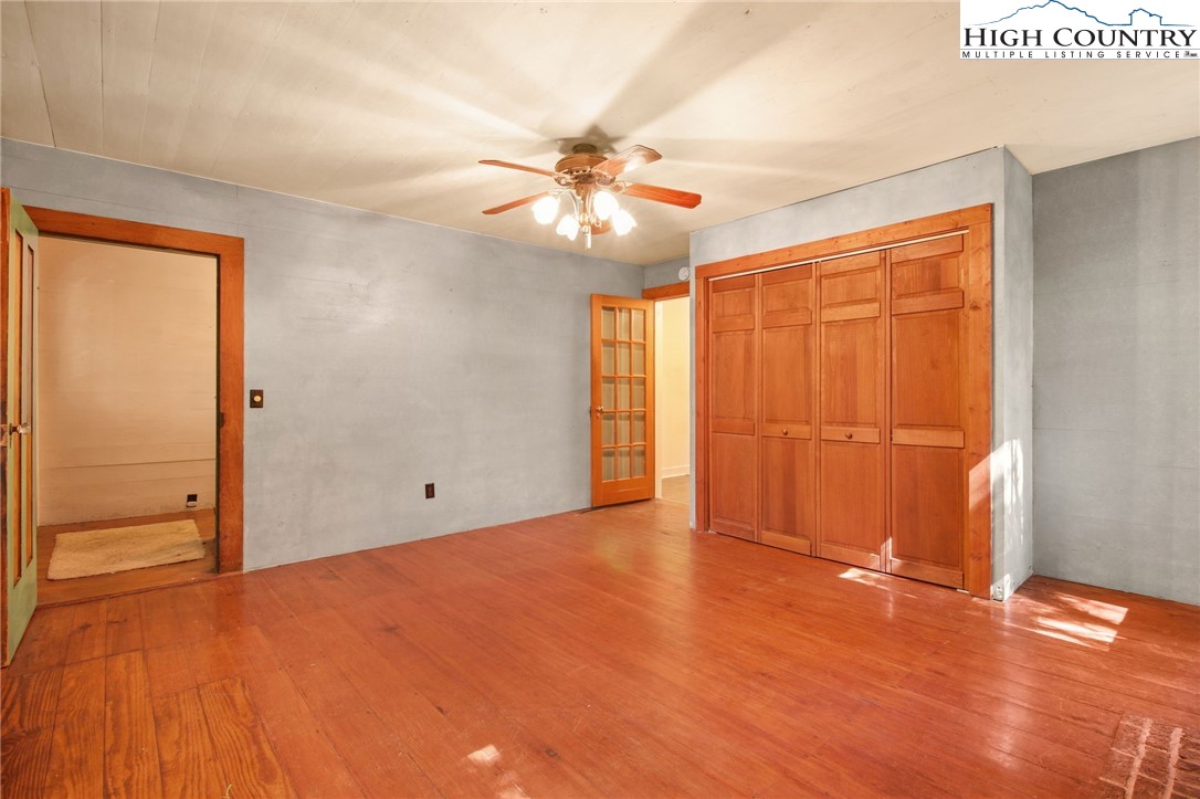2166 George Hayes Road Boone, NC 28607 - Photo 29 of 50 an empty room with closet and a ceiling fan