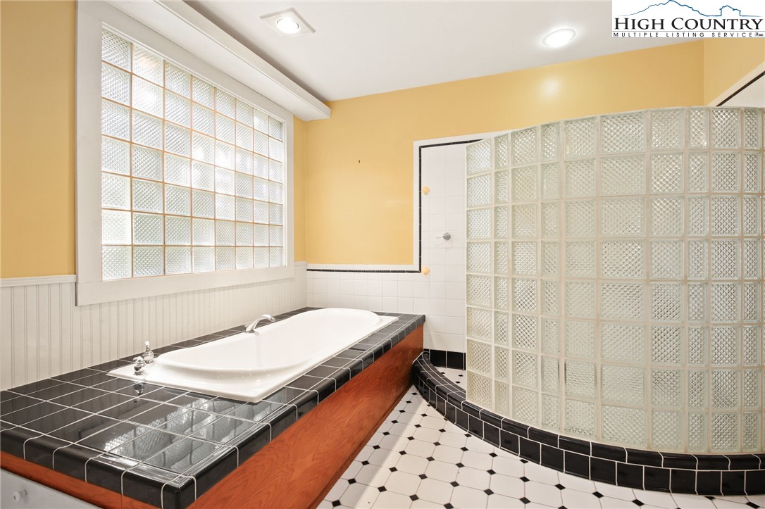 2166 George Hayes Road Boone, NC 28607 - Photo 37 of 50 a bathroom with a sink toilet and shower