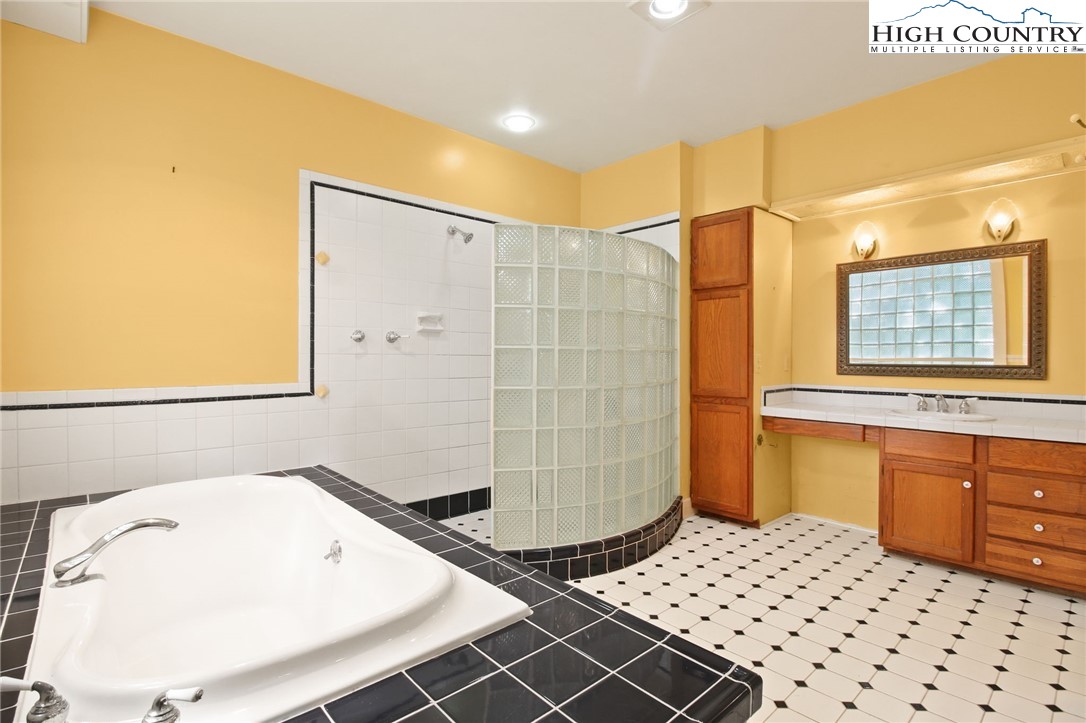 2166 George Hayes Road Boone, NC 28607 - Photo 38 of 50 a bathroom with a sink and a mirror