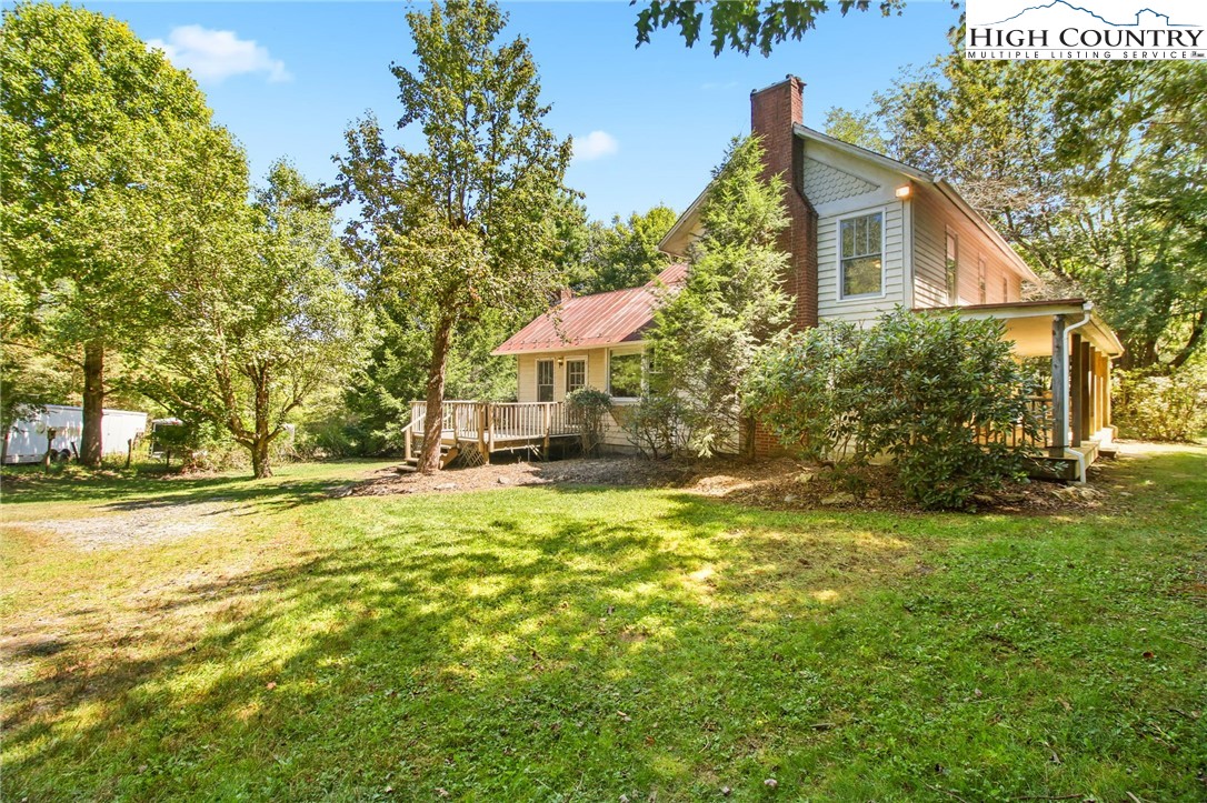2166 George Hayes Road Boone, NC 28607 - Photo 5 of 50 a view of a house with a yard and tree s