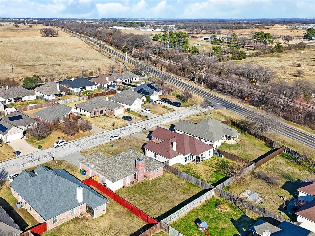 207 Quail Run Aubrey, TX 76227 - Photo 27 of 30 Aerial view of property and surrounding area featuring nearby suburban area