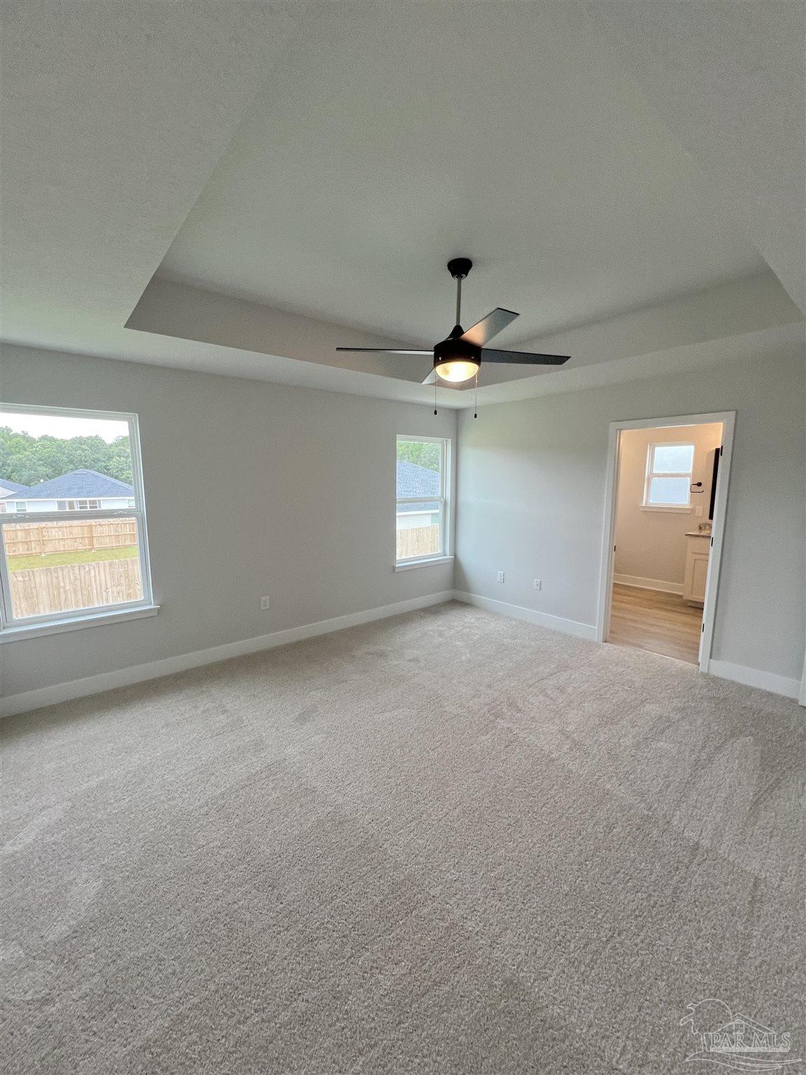 3339 Bliss Lane, Unit 9E Cantonment, FL 32533 - Photo 8 of 13 a view of an empty room with a window