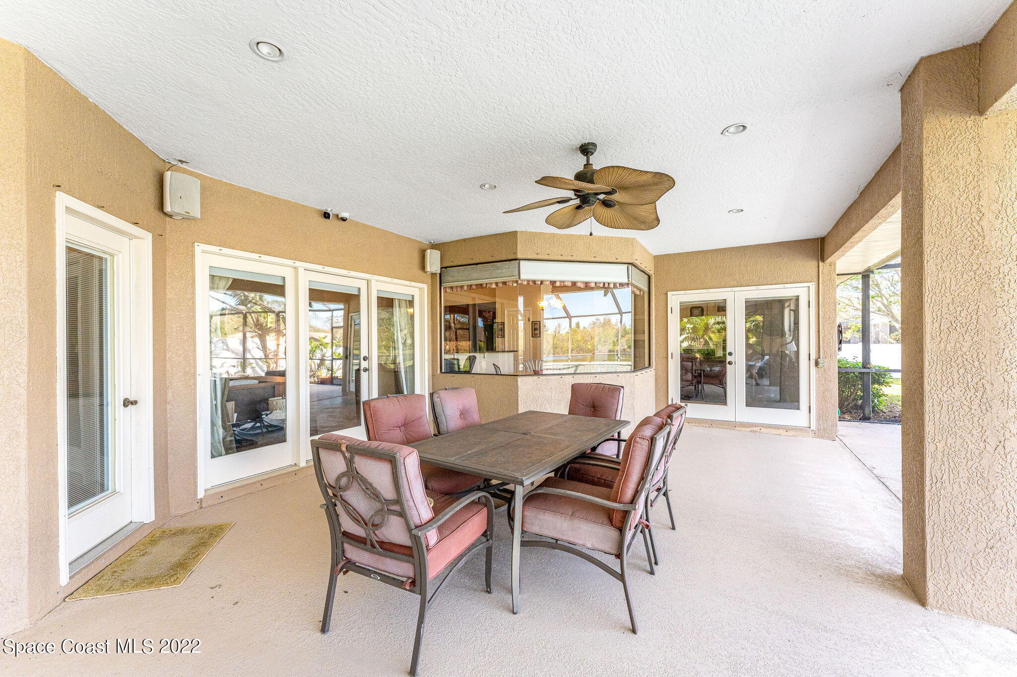 4668 Canard Road Melbourne, FL 32934 - Photo 17 of 29 a dining room with furniture and wooden floor