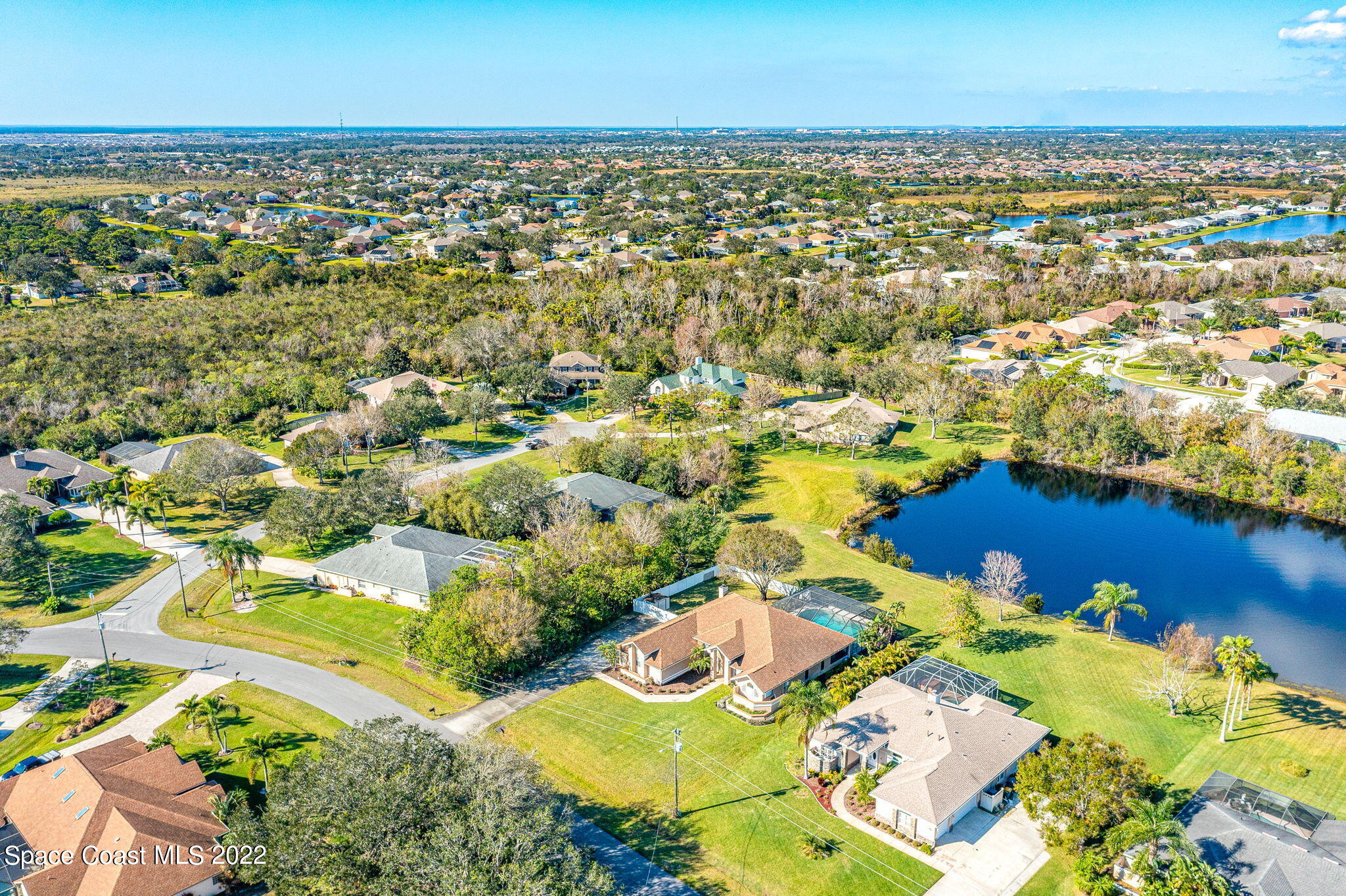 4668 Canard Road Melbourne, FL 32934 - Photo 26 of 29 an aerial view of residential houses with outdoor space