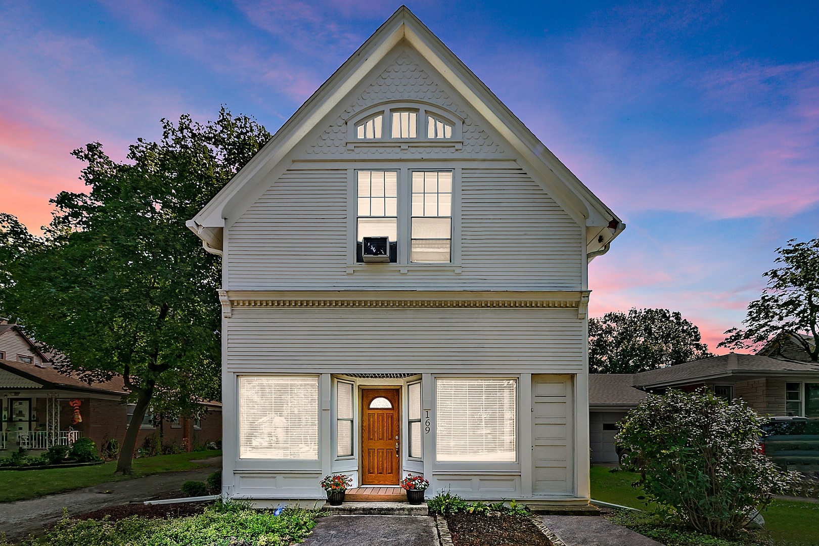 169 Barrypoint Road Riverside, IL 60546 - Photo 1 of 27 a front view of a house with a yard