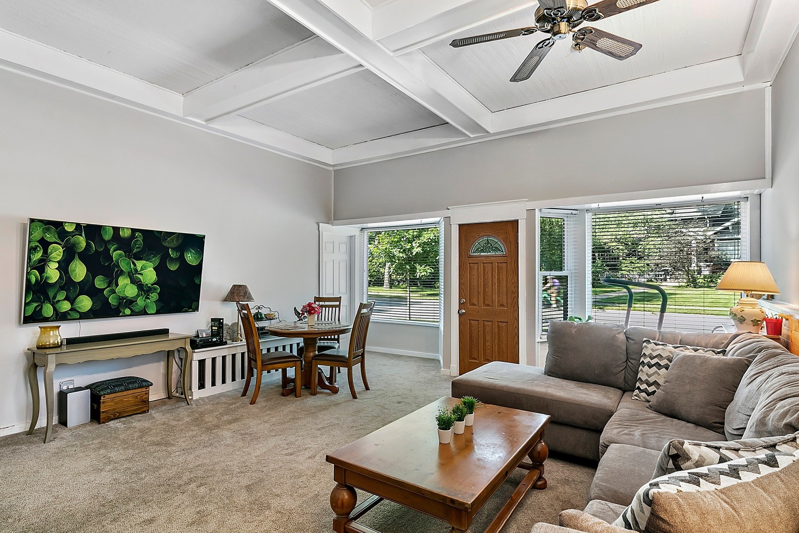 169 Barrypoint Road Riverside, IL 60546 - Photo 3 of 27 a living room with furniture and a flat screen tv