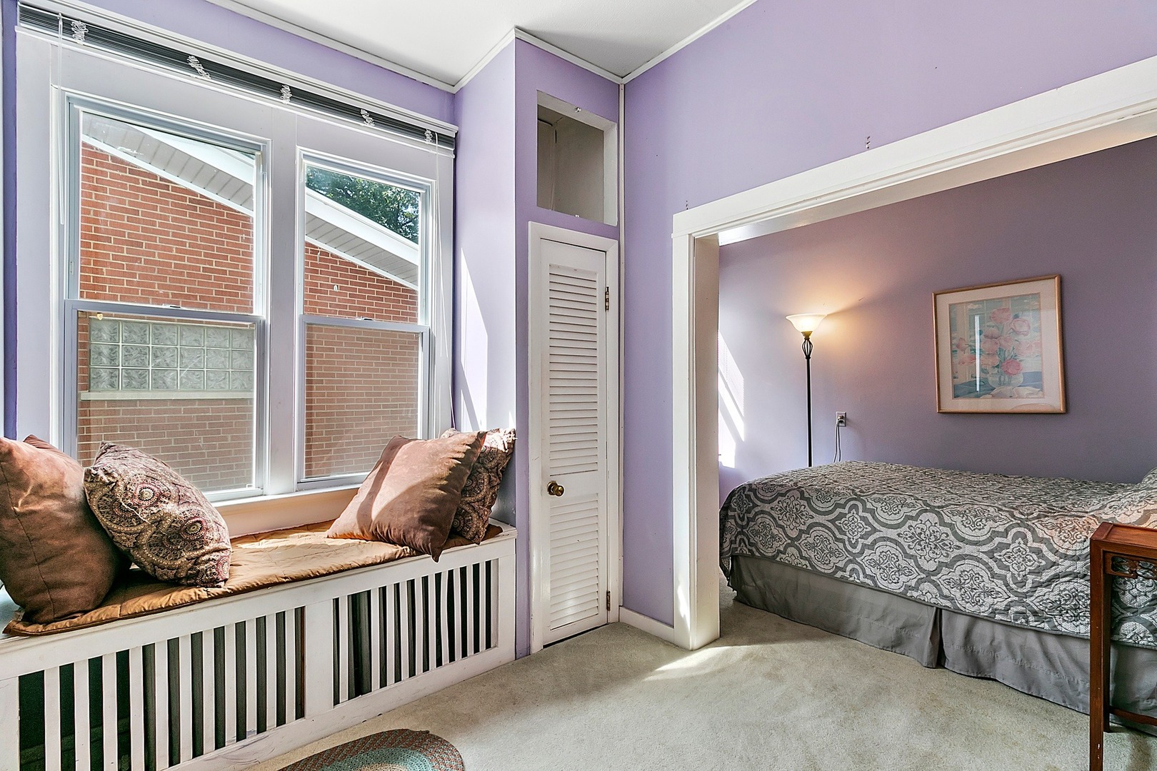 169 Barrypoint Road Riverside, IL 60546 - Photo 5 of 27 a bedroom with a bed and a window