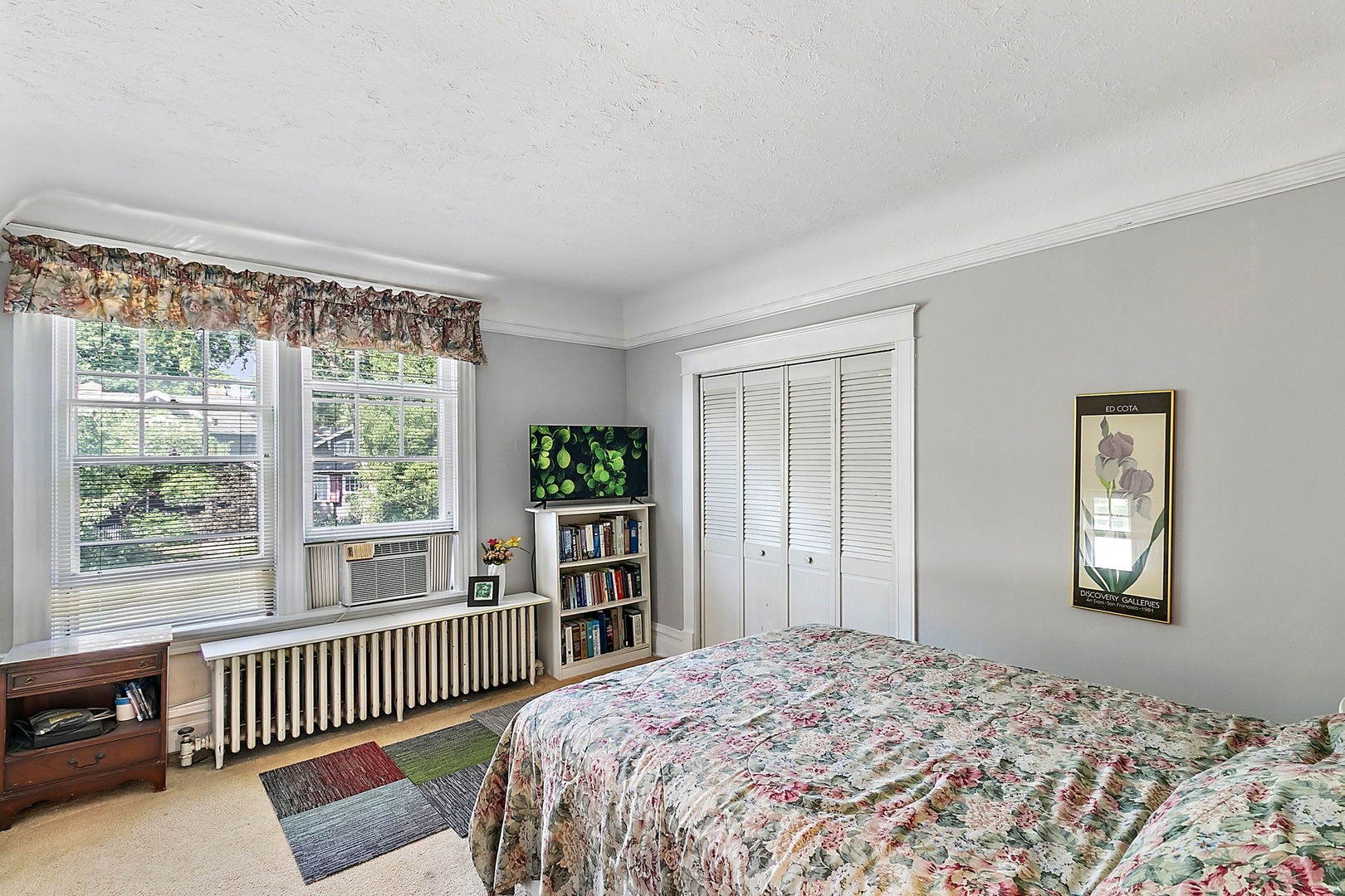 169 Barrypoint Road Riverside, IL 60546 - Photo 9 of 27 a bedroom with a bed and a window