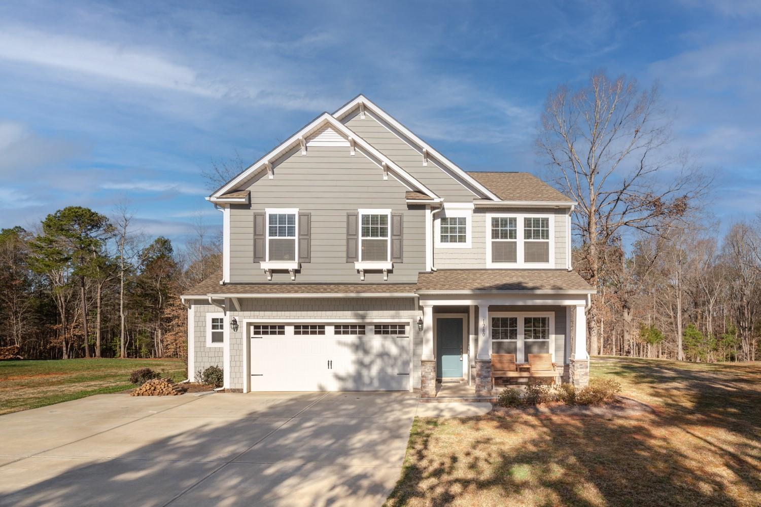 1280 West Rebound Road Lancaster, SC 29720 - Photo 1 of 34 a front view of a house with a yard