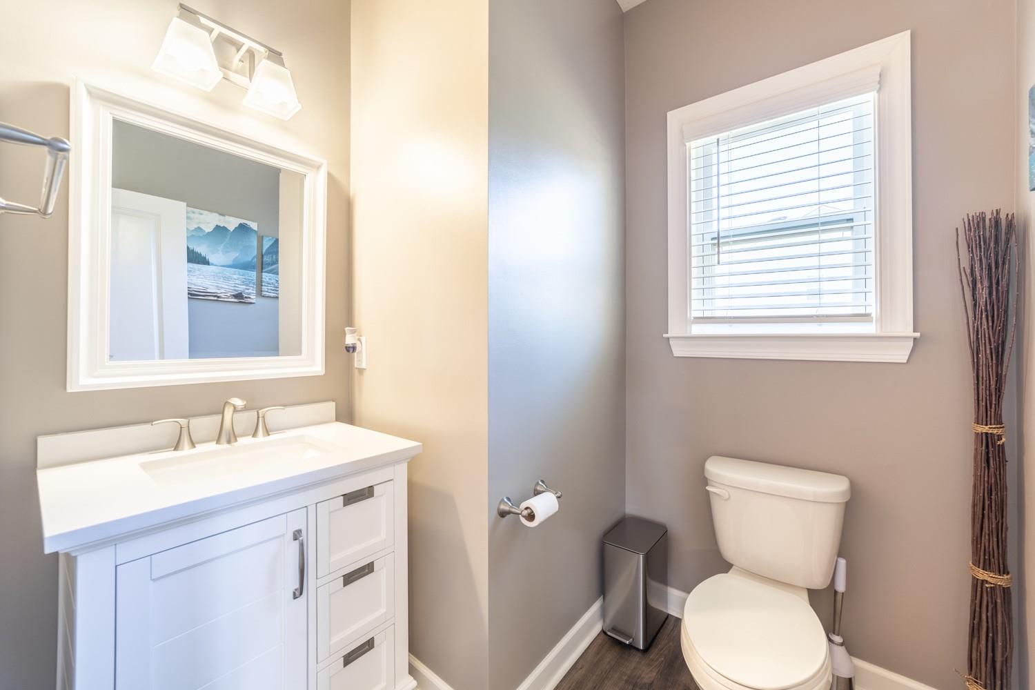 1280 West Rebound Road Lancaster, SC 29720 - Photo 13 of 34 a bathroom with a toilet sink and mirror