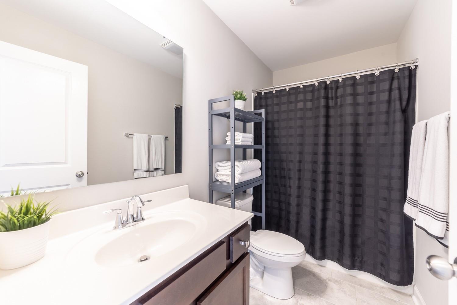 1280 West Rebound Road Lancaster, SC 29720 - Photo 27 of 34 a bathroom with a sink toilet and shower