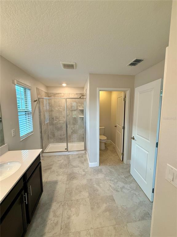 1421 Happy Bird Lane Winter Springs, FL 32708 - Photo 12 of 16 a view of an empty room with glass door