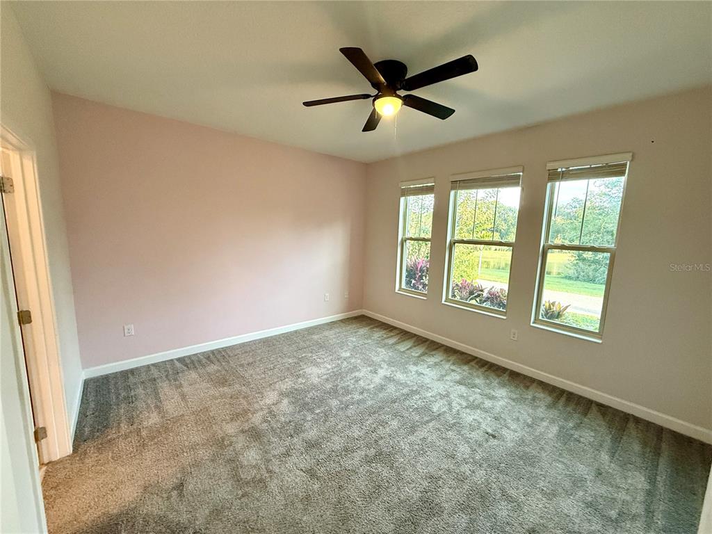1421 Happy Bird Lane Winter Springs, FL 32708 - Photo 5 of 16 a view of an empty room with a window