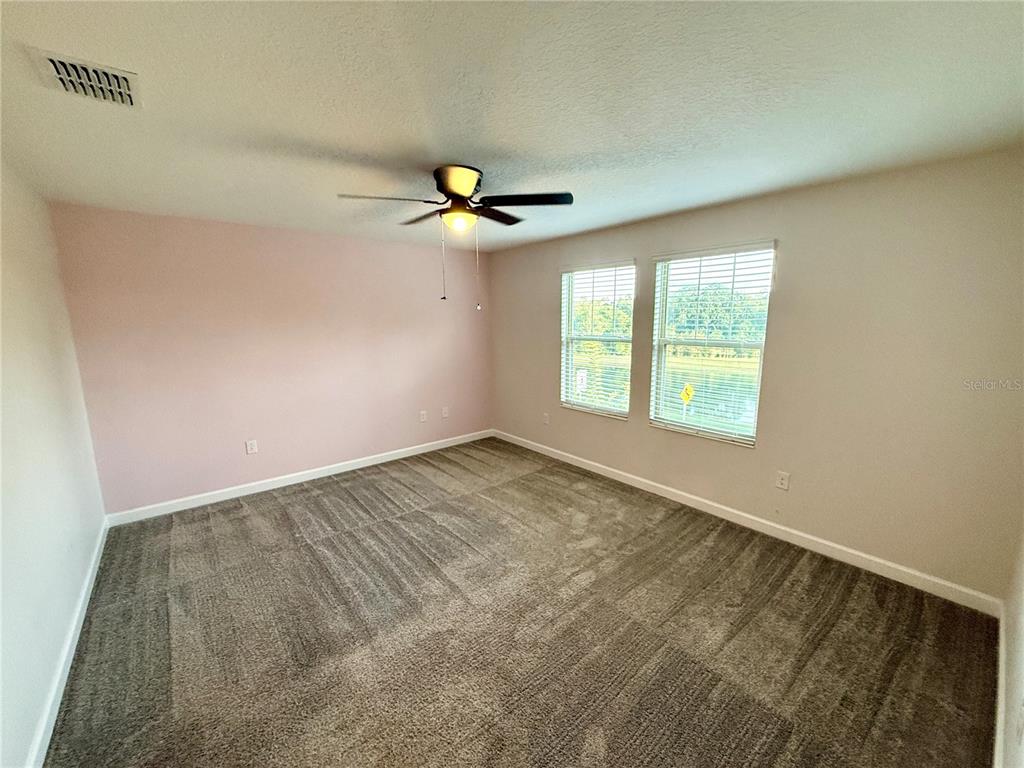 1421 Happy Bird Lane Winter Springs, FL 32708 - Photo 10 of 16 an empty room with a window