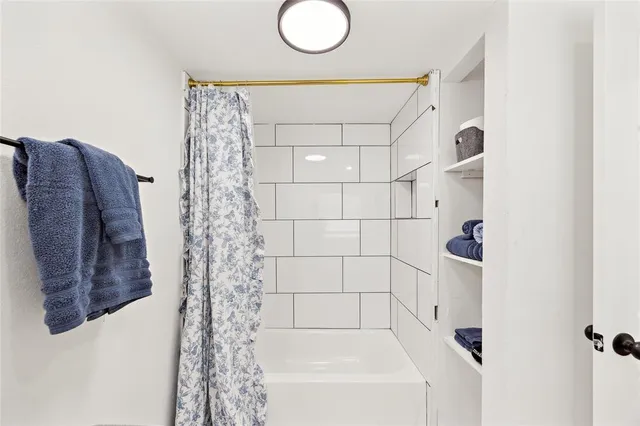 a view of kitchen with sink and wooden floor