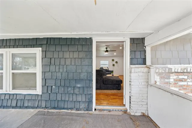 a bathroom with a tub and shower