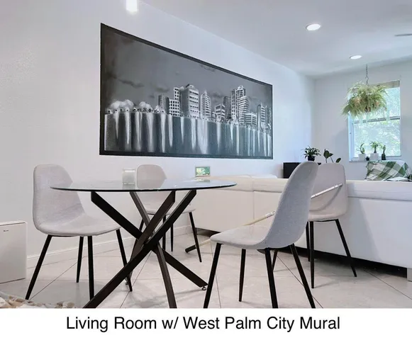 a black and white photo of a living room