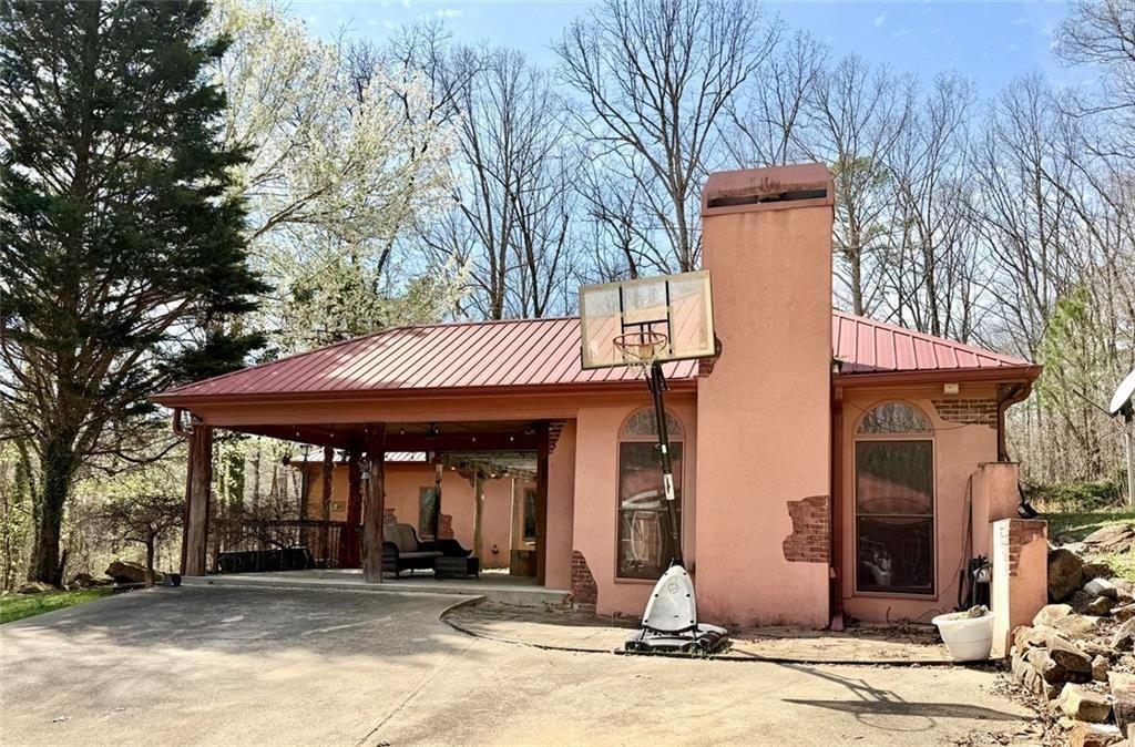 9011 High Point Road Villa Rica, GA 30180 - Photo 12 of 68 a front view of a house with garden