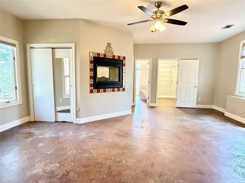 9011 High Point Road Villa Rica, GA 30180 - Photo 26 of 68 a view of empty room with window and ceiling fan