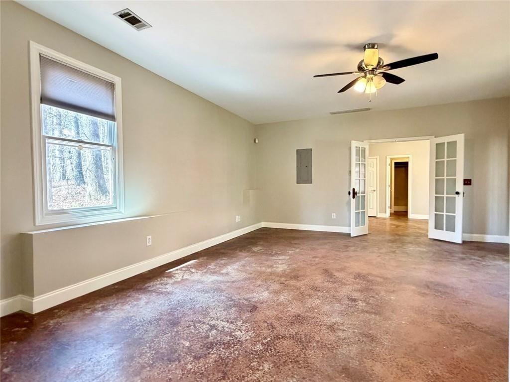 9011 High Point Road Villa Rica, GA 30180 - Photo 28 of 68 a view of a livingroom with a ceiling fan and window