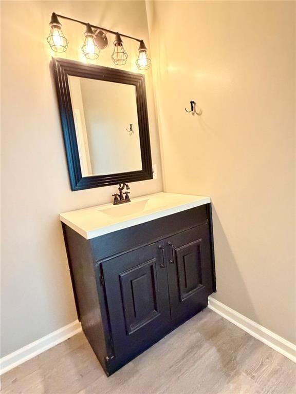 9011 High Point Road Villa Rica, GA 30180 - Photo 53 of 68 a bathroom with a sink vanity and a mirror