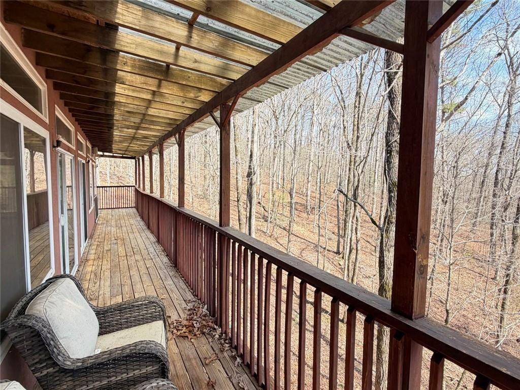 9011 High Point Road Villa Rica, GA 30180 - Photo 56 of 68 a view of balcony with wooden floor and outdoor seating