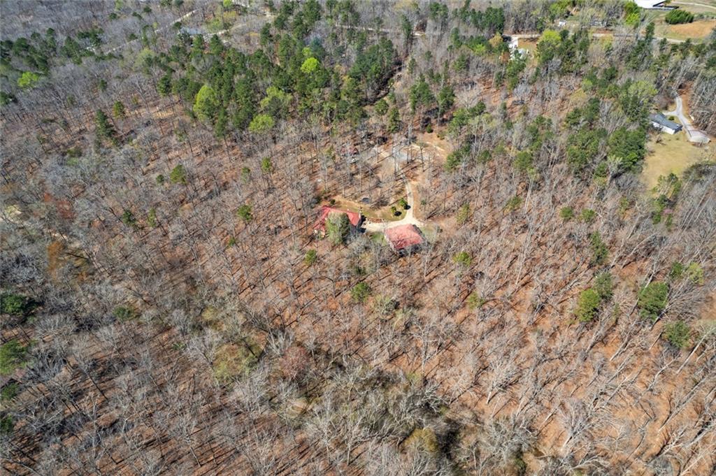 9011 High Point Road Villa Rica, GA 30180 - Photo 67 of 68 a backyard of a house with lots of green space