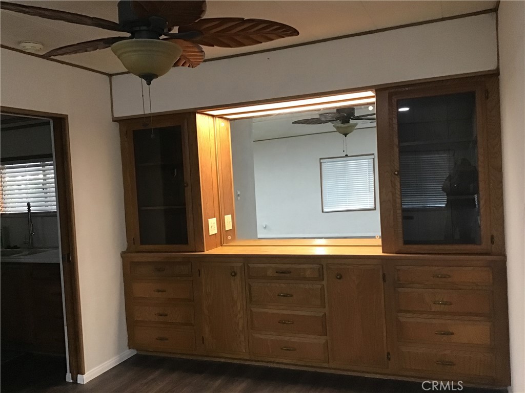 7271 Katella Stanton, CA 90680 - Photo 15 of 43 a bathroom with a mirror and a sink