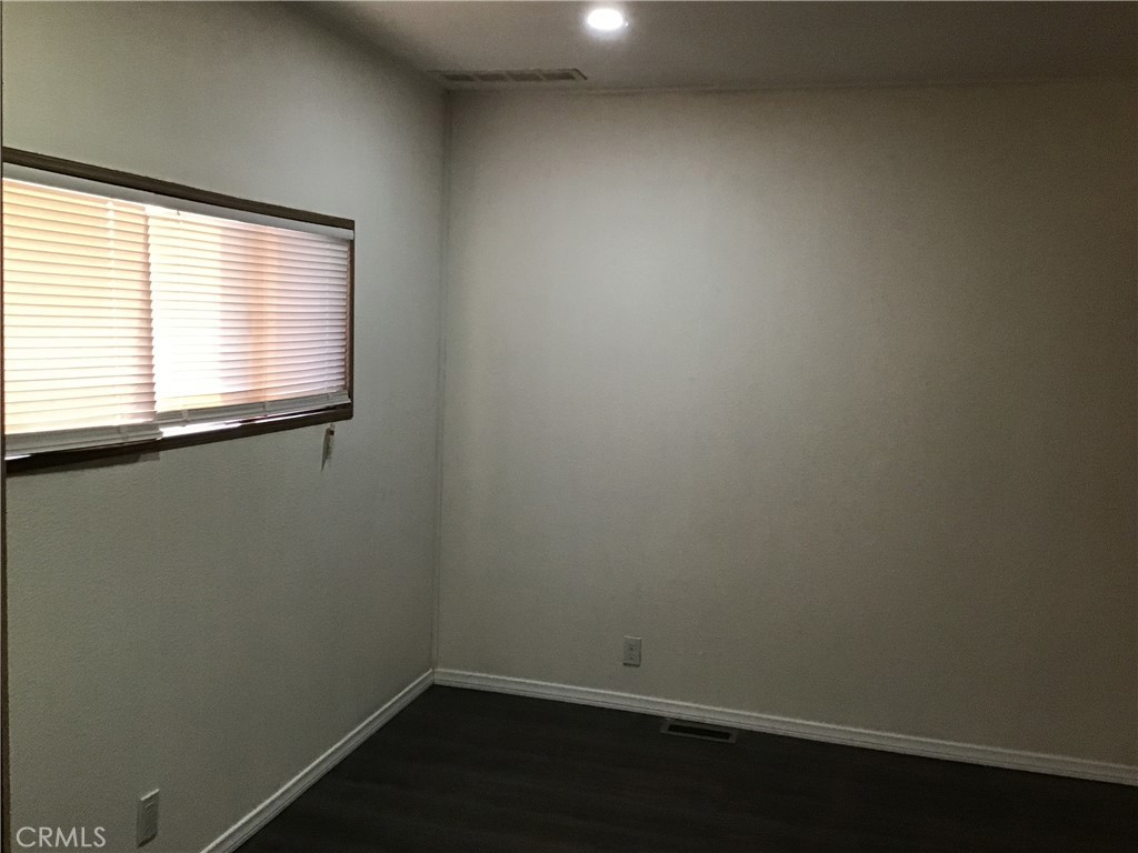 7271 Katella Stanton, CA 90680 - Photo 27 of 43 an empty room with a window