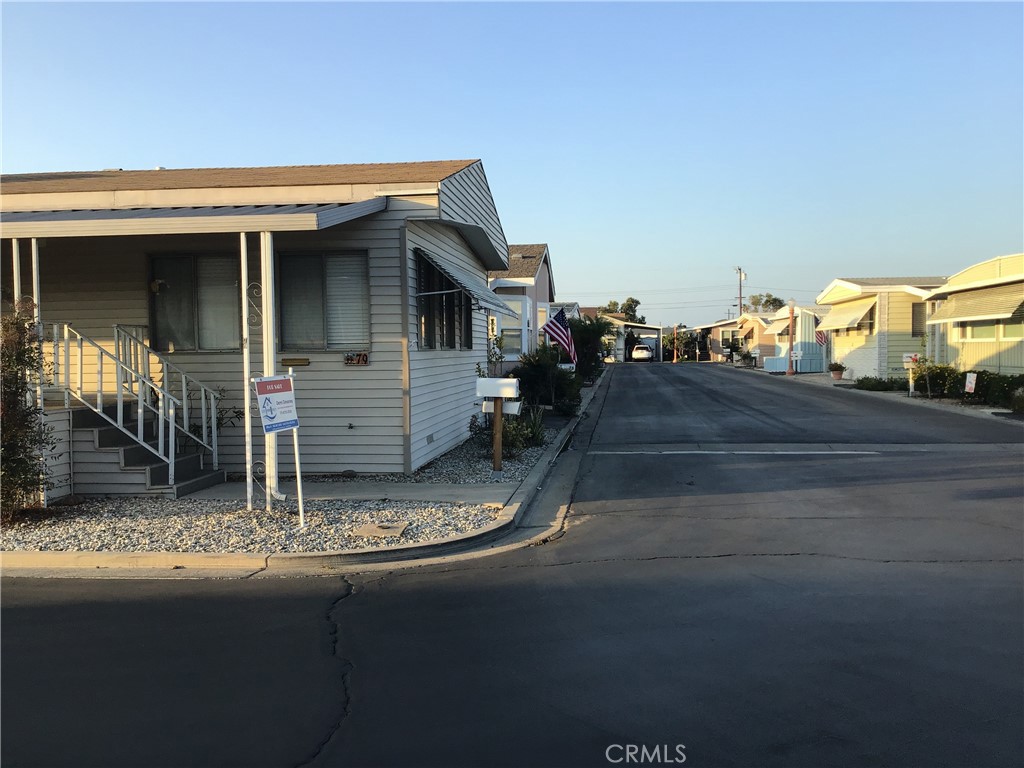 7271 Katella Stanton, CA 90680 - Photo 4 of 43 a view of house with backyard
