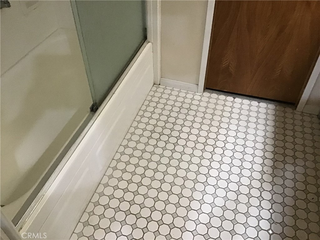 7271 Katella Stanton, CA 90680 - Photo 42 of 43 a bathroom with a bathtub